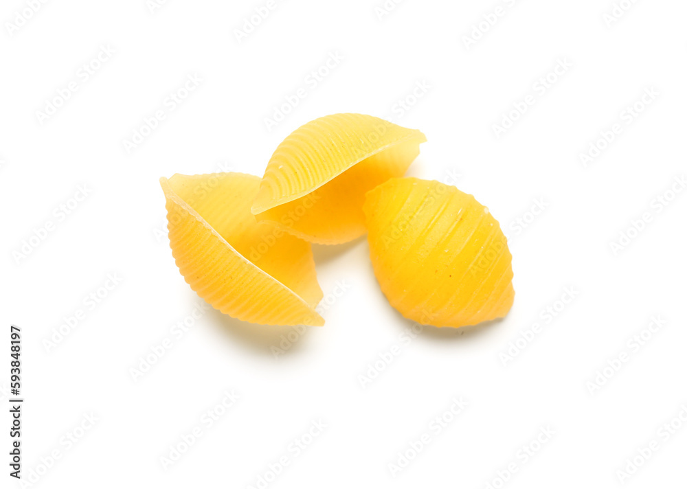 Raw conchiglie pasta isolated on white background