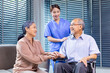 © Akarawut - Senior asian couple having appointment with doctor for annual health check up program while the nurse is explaining the blood test result for healthy aging and longevity concept