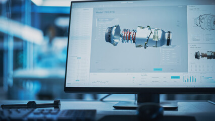 Wall Mural - Close Up of a Computer Monitor Display with 3D CAD Software with Prototype Turbine Motor Project. Interface with Vital Setting and Programming Options for the Industrial Engine Prototype.