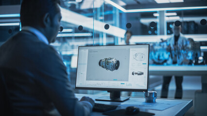 Fototapete - Industrial Developer Working on CAD Software on Desktop Computer in Turbine Engine Startup Facility. Specialists and Professionals Researching and Developing High Tech Engine Technology.
