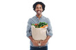 © Shubham/peopleimages.com - Grocery bag, happy and portrait of a black man after shopping isolated on a transparent png background. Smile, customer and a person with food from the supermarket for a healthy diet and hunger