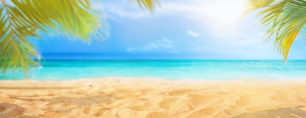 Wall Mural - beautiful wide panorama of a paradise beach with golden sand and palm leaves in blur. summer banner.