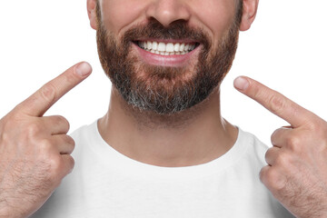 Man showing healthy gums on white background, closeup