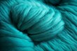Bright turquoise woolen threads. Soft yarn macro view knitting hobby needlework. Handmade natural rope skein warm clothes. Traditional knitting wool supplies