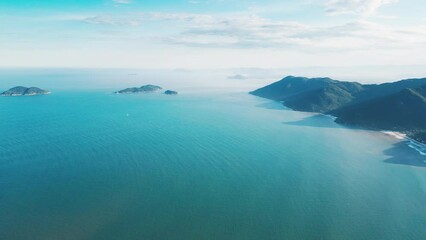 Wall Mural - Aerial view of the Brazilian coastline with mountains near the town of Acores, on the island of Santa Catarina, Brazil