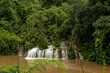 Scenic view of the Saiyok Yai waterfall in an evergreen forest in Thailand