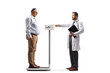 © Ljupco Smokovski - Doctor measuring a mature patient on a weight scale