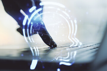 Poster - Creative artificial Intelligence concept with human head hologram and hands typing on laptop on background. Multiexposure