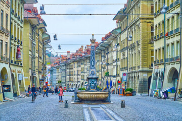 Wall Mural - Kreuzgassbrunnen fountain on Kramgasse street in Bern, Switzerland