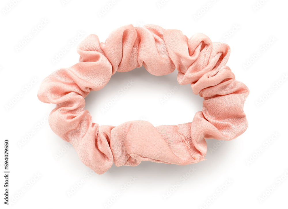 Pink silk scrunchy on white background