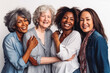 © VisualProduction - Four fun loving playful smiling multiethnic older women posing in the studio against light background. Generative AI.