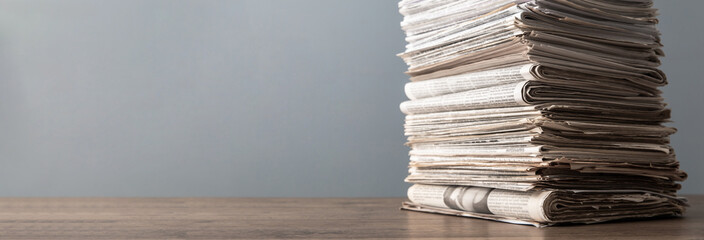 Wall Mural - stack of newspapers on table