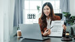 © Phushutter - Explain the details of the contract. Online consulting with laptop in office of asian thai japanese chinese female exclusive lawyer legal advisor, legislation, saleswoman, legal contract documents