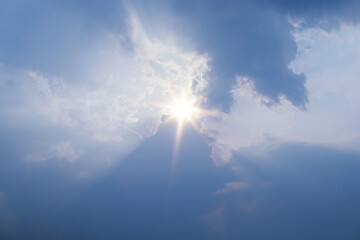 Wall Mural - cloudy sky with ray light shining in middle of day. image for create content about nature editing.
