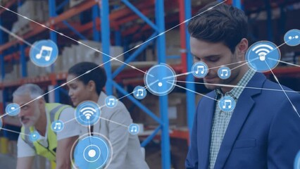 Poster - animation of network of connections with icons over diverse people working in warehouse