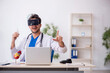 © Elnur - Young male doctor enjoying virtual glasses in the clinic