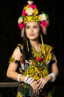 A Borneo lady showcasing the beauty of her culture through her stunning traditional clothing