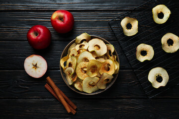 Wall Mural - Concept of tasty food, dried apple chips, top view