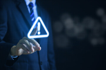 Wall Mural - businessman touch warning triangle and exclamation sign icon caution of dangerous problems server er