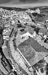 Canvas Print - Aerial view of Setenil de las Bodegas, Andalusia. It is famous for its dwellings built into rock overhangs above the river