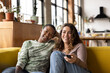 © ReeldealHD images - Female Friends watching Television in a loft apartment