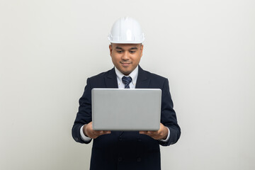 Businessman manager owner real estate working with laptop computer on isolated white background. Cooperation of architect designer. Engineer with safety helmet checking at working construction site