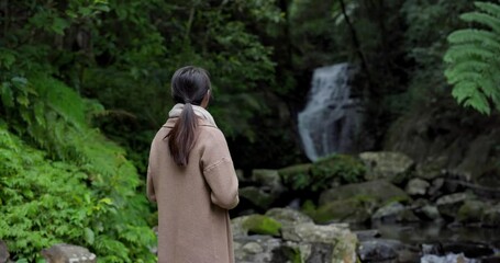 Wall Mural - Tourist woman go Wufengqi Waterfall in Yilan of Taiwan