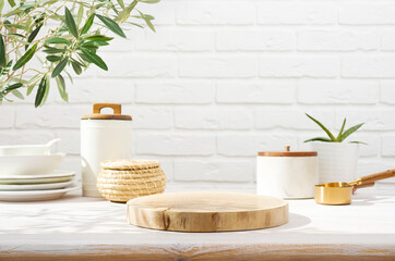 Wall Mural - empty wooden pedestal on kitchen table before white brick wall