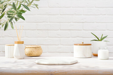 Wall Mural - empty marble podium on bathroom table before white brick wall