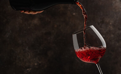 Wall Mural - Pouring red wine