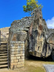 Wall Mural - Vertical shot of the ruins of Machu Picchu in Peru