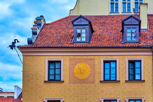 A Sundial On The Facade Of A House In The Old Town In Warsaw