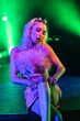 © Dmitrijs Karcevs/Wirestock Creators - Beautiful Ukrainian actress and performer Elyzaveta, Liza Rusina in a studio with green lights