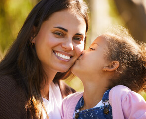 Sticker - Isnt she lovely. an attractive young woman and her daughter sharing an intimate moment during their picnic in the park.