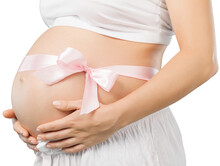 Pregnant Woman Belly With Pink Ribbon