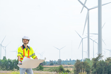 Poster - Engineer inspection and survey work in wind turbine farms rotation to generate electricity energy.