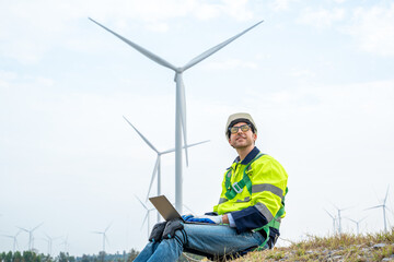 Poster - Engineer checking control electric power at windmill farm,Generating electricity clean energy.