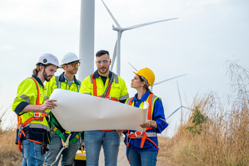 Poster - Service engineers discussing and inspection work at wind turbine farm,Renewable energy,Clean energy and environment.