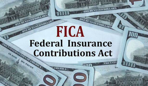FICA - acronym on the background of cash dollar bills