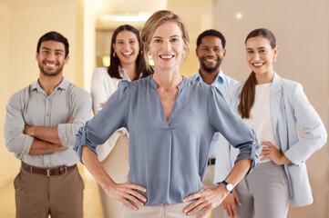 Poster - Take charge of your success. Portrait of a mature businesswoman standing in an office with her colleagues in the background.