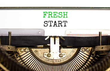Wall Mural - Fresh start and motivational symbol. Concept words Fresh start typed on beautiful old retro typewriter. Beautiful white background. Business motivational and Fresh start concept. Copy space.
