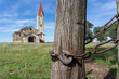 Detail of post and chain access to the field where the old abandoned Catholic church is located