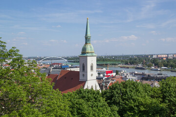 Wall Mural - Beautiful view of St. Martin's Cathedral on the banks of the Danube in the old town of Bratislava, Slovakia on a sunny summer day 