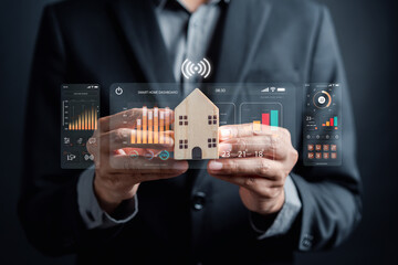 Aufkleber - Smart home digital remote control on smartphone concept. internet of things in technology control. Businessman holding wooden house with virtual smart home icon function.