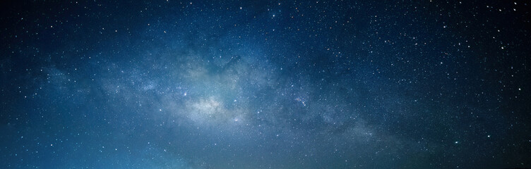 Space background with night starry sky and Milky Way. Dark blue nebula.