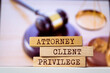 © Uuganbayar - Wooden blocks with words 'Attorney-Client Privilege'. Legal concept