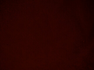 dark red velvet fabric texture used as background. empty dark red fabric background of soft and smoo