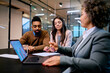 © Drazen - Young black couple having meeting with financial advisor in office.