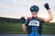 © Azeemud-Deen Jacobs/peopleimages.com - Celebrate, sport and portrait of happy woman with medal for winning outdoor cycling race or triathlon. Happiness, win and cyclist with smile, fitness and excited celebration for gold winner at sunset
