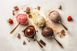 Ice cream scoop background, top view image. Strawberry, chocolate, vanilla flavours, fruits, Italian gelato dessert concept. Summer tasty ice cream.